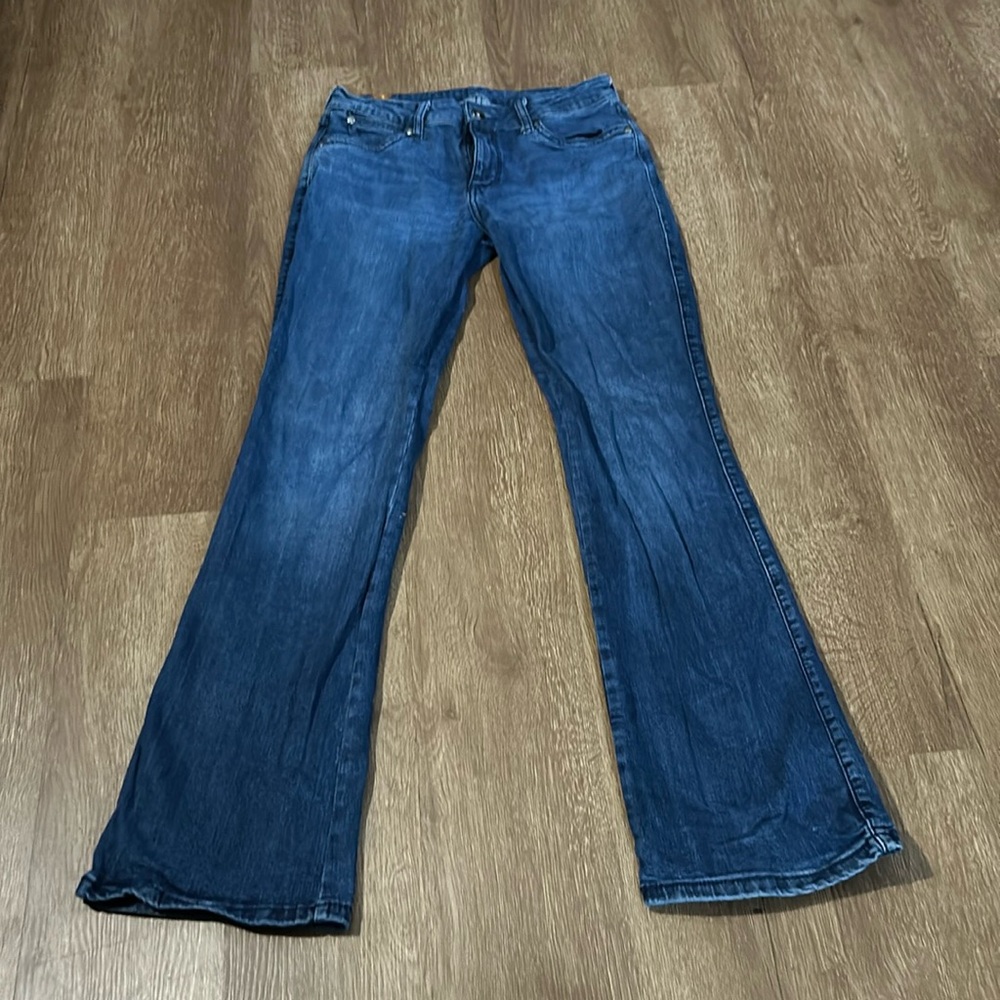 Woman’s boot cut jeans. Size small avg. dark wash